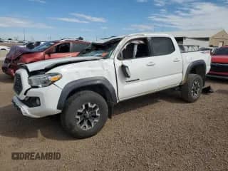 2020 Toyota Tacoma TRD Off Road with VIN 3TMCZ5AN1LM290275, listed as a Copart auction lot 81657685 with 131,128 mi miles and Non repairable. Bid and sale history available at DreamBid. Image 1.