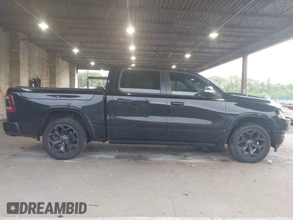 2020 Ram 1500 Limited z VIN 1C6SRFHT2LN147306, wystawiony jako IAAI lot #42310509 z przebiegiem 74 087 mil mil oraz . Historia ofert i sprzedaży dostępna na DreamBid. Obrazek 14.
