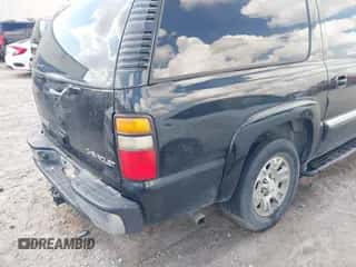 2005 Chevrolet Suburban LT z VIN 3GNEC16Z65G204577, wystawiony jako IAAI lot #43254585 z przebiegiem 231 024 mil mil oraz . Historia ofert i sprzedaży dostępna na DreamBid. Obrazek 6.