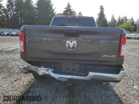 2021 Ram 1500 Tradesman with VIN 1C6SRFNM4MN500773, listed as a Copart auction lot 61540325 with 131,004 mi miles and Salvage title. Bid and sale history available at DreamBid. Image 6.