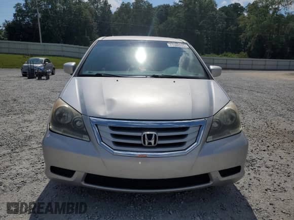 2010 Honda Odyssey EX с VIN 5FNRL3H42AB043863, выставлен на аукционе Copart как лот 71588935 с пробегом 200 740 миль миль и Списание • Salvage title. История ставок и продаж доступна на DreamBid. Изображение 5.