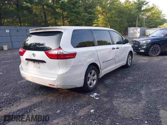 2015 Toyota Sienna L with VIN 5TDZK3DCXFS614096, listed as a IAAI auction lot 39977158 with 93,471 mi miles and . Bid and sale history available at DreamBid. Image 4.