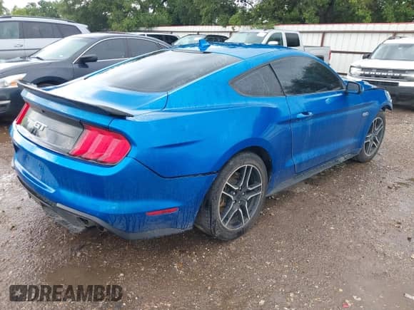 2021 Ford Mustang GT с VIN 1FA6P8CF2M5144006, выставлен на аукционе IAAI как лот 42507152 с пробегом 49 347 миль миль и . История ставок и продаж доступна на DreamBid. Изображение 4.