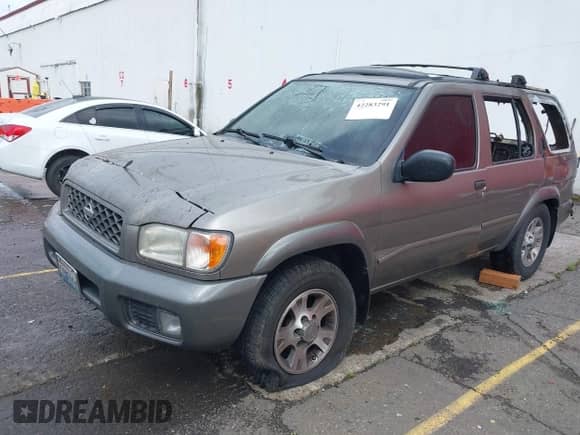 2001 Nissan Pathfinder SE z VIN JN8DR09Y21W615524, wystawiony jako IAAI lot #42283291 z przebiegiem Nie podano mil oraz . Historia ofert i sprzedaży dostępna na DreamBid. Obrazek 2.