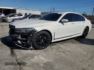 2020 BMW 7 Series 740i with VIN WBA7T2C08LCD59600, listed as a Copart auction lot 87105445 with 72,700 mi miles and Salvage title. Bid and sale history available at DreamBid. Image 1.