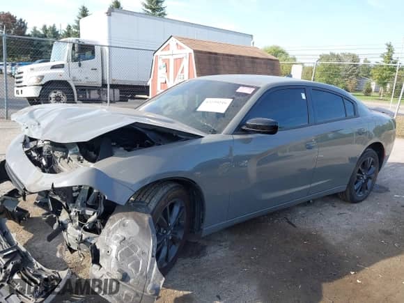 2023 Dodge Charger SXT with VIN 2C3CDXJG7PH704485, listed as a IAAI auction lot 43229216 with 18,544 mi miles and . Bid and sale history available at DreamBid. Image 2.