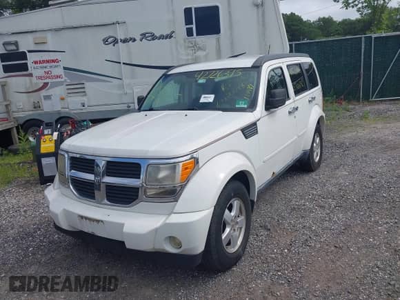 2009 Dodge Nitro SE with VIN 1D8GU28K59W513566, listed as a IAAI auction lot 42726395 with 134,489 mi miles and . Bid and sale history available at DreamBid. Image 2.