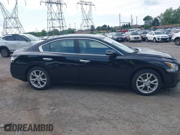 2014 Nissan Maxima SV z VIN 1N4AA5AP4EC477861, wystawiony jako IAAI lot #42542497 z przebiegiem 103 294 mil mil oraz . Historia ofert i sprzedaży dostępna na DreamBid. Obrazek 14.