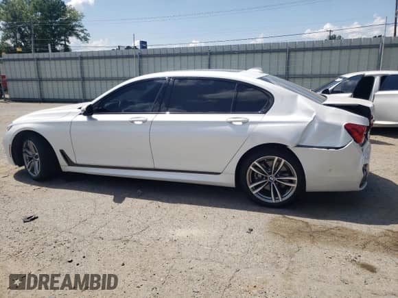 2019 BMW 7 Series 750i with VIN WBA7F0C55KGM24513, listed as a Copart auction lot 61728595 with 26,303 mi miles and Salvage title. Bid and sale history available at DreamBid. Image 2.