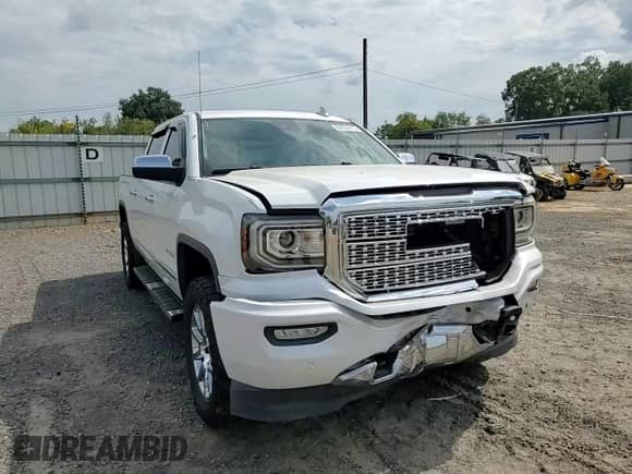 2016 GMC Sierra 1500 Denali z VIN 3GTU2PEJ1GG221537, wystawiony jako Copart lot #80850875 z przebiegiem Nie podano mil oraz Szkoda całkowita • Salvage title. Historia ofert i sprzedaży dostępna na DreamBid. Obrazek 13.