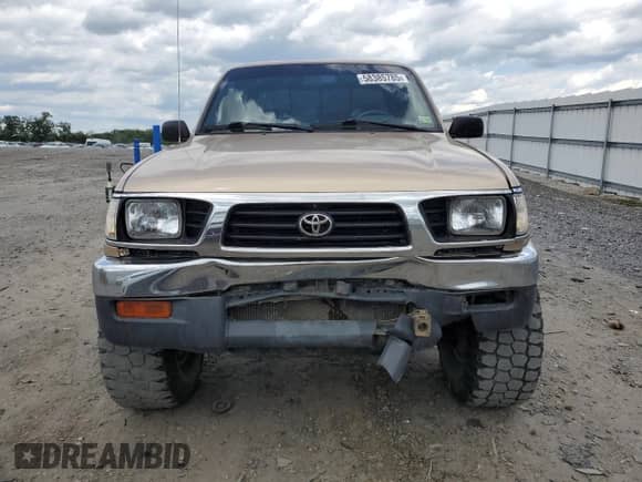 1997 Toyota Tacoma z VIN 4TAWM72N1VZ279828, wystawiony jako Copart lot #58385785 z przebiegiem 347 448 mil mil oraz Szkoda całkowita • Salvage title. Historia ofert i sprzedaży dostępna na DreamBid. Obrazek 5.