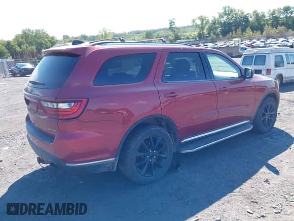 2014 Dodge Durango Limited with VIN 1C4RDJDG9EC552384, listed as a IAAI auction lot 43140116 with 142,339 mi miles and . Bid and sale history available at DreamBid. Image 4.