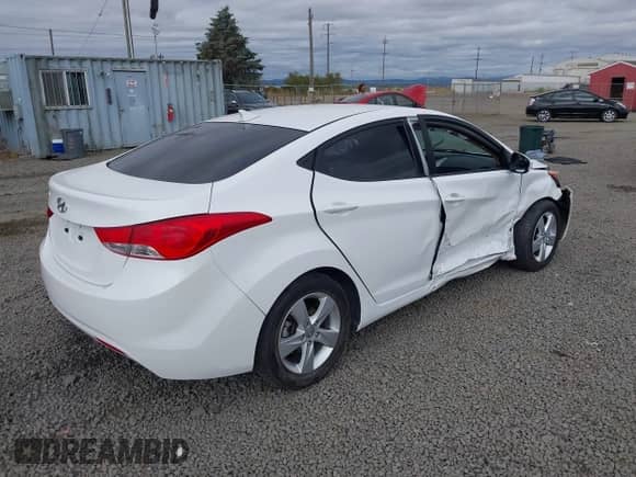 2013 Hyundai Elantra GLS z VIN 5NPDH4AE8DH255600, wystawiony jako IAAI lot #42917259 z przebiegiem 71 002 mil mil oraz . Historia ofert i sprzedaży dostępna na DreamBid. Obrazek 4.