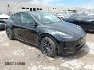 2022 Tesla Model Y Performance with VIN 7SAYGDEF4NF394651, listed as a IAAI auction lot 42600102 with 74,504 mi miles and . Bid and sale history available at DreamBid. Image 1.