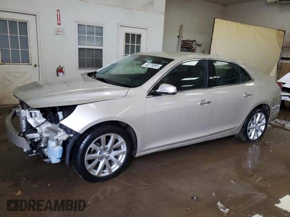 2016 Chevrolet Malibu LTZ with VIN 1G11E5SA7GF137638, listed as a Copart auction lot 43270895 with 135,640 mi miles and Salvage title. Bid and sale history available at DreamBid. Image 1.