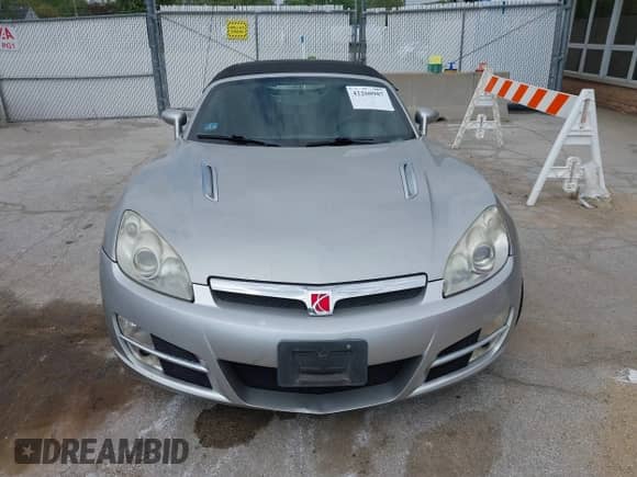 2009 Saturn Sky with VIN 1G8MC35B59Y100284, listed as a IAAI auction lot 42260987 with 86,049 mi miles and . Bid and sale history available at DreamBid. Image 12.