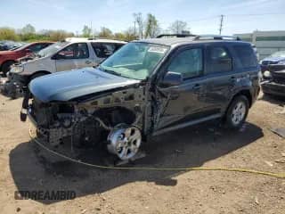 2010 Mercury Mariner Premier with VIN 4M2CN9H78AKJ26918, listed as a Copart auction lot 56000095 with 195,357 mi miles and Salvage title. Bid and sale history available at DreamBid. Image 1.