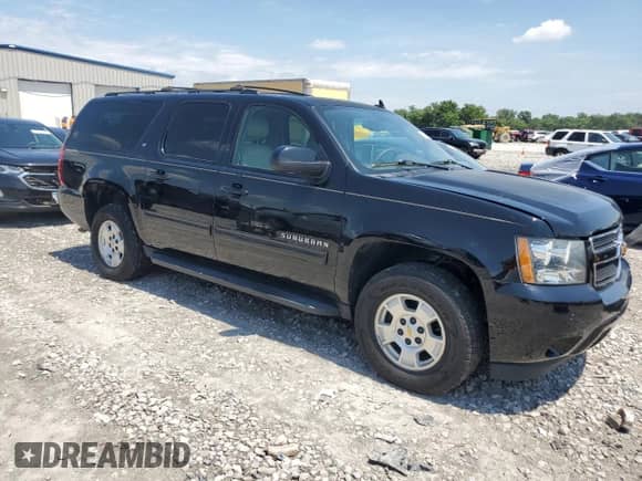 2013 Chevrolet Suburban LT with VIN 1GNSKJE70DR222223, listed as a Copart auction lot 64103285 with 216,118 mi miles and Clean title. Bid and sale history available at DreamBid. Image 4.