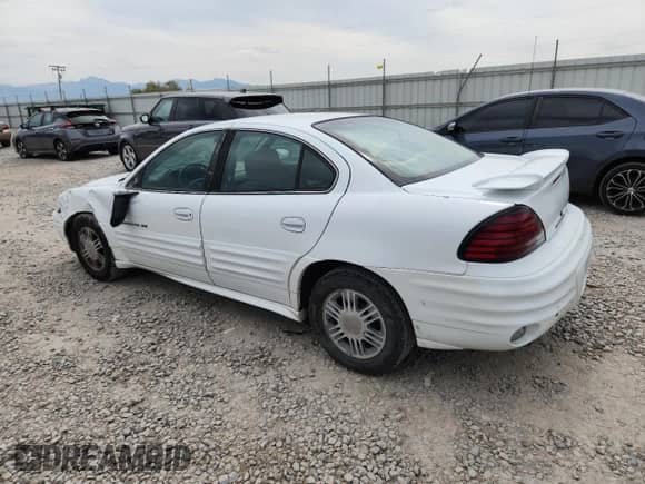 2002 Pontiac Grand Am SE1 with VIN 1G2NF52F92C113762, listed as a Copart auction lot 71672305 with 180,444 mi miles and Salvage title. Bid and sale history available at DreamBid. Image 2.