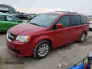 2014 Dodge Grand Caravan SXT with VIN 2C4RDGCG2ER234957, listed as a Copart auction lot 67056665 with 97,652 mi miles and Salvage title. Bid and sale history available at DreamBid. Image 1.