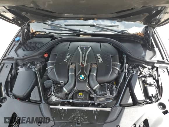 2018 BMW 5 Series M550i xDrive with VIN WBAJB9C53JB286164, listed as a Copart auction lot 71052315 with 91,157 mi miles and Clean title. Bid and sale history available at DreamBid. Image 11.