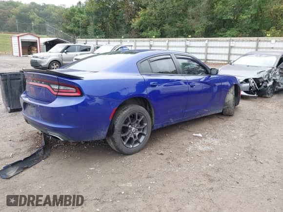 2018 Dodge Charger GT with VIN 2C3CDXJG1JH291759, listed as a IAAI auction lot 43301004 with 115,854 mi miles and . Bid and sale history available at DreamBid. Image 4.