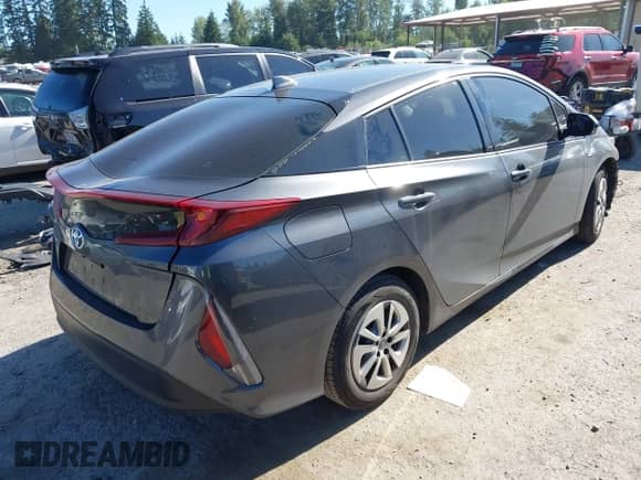 2018 Toyota Prius Plus z VIN JTDKARFP1J3071500, wystawiony jako IAAI lot #42665651 z przebiegiem 168 014 mil mil oraz . Historia ofert i sprzedaży dostępna na DreamBid. Obrazek 4.