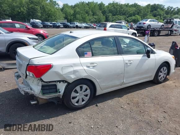2014 Subaru Impreza with VIN JF1GJAA61EH016856, listed as a IAAI auction lot 42682263 with 69,106 mi miles and . Bid and sale history available at DreamBid. Image 18.