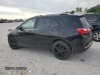 2021 Chevrolet Equinox Premier с VIN 2GNAXXEV1M6124070, выставлен на аукционе Copart как лот 71281385 с пробегом 56 851 миль миль и Списание • Salvage title. История ставок и продаж доступна на DreamBid. Изображение 2.