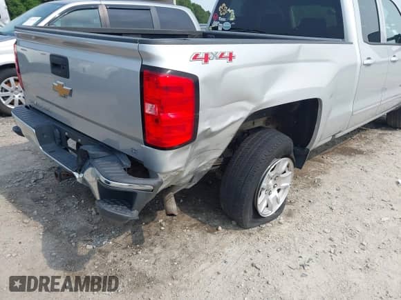 2017 Chevrolet Silverado 1500 LT with VIN 1GCVKREH2HZ253413, listed as a IAAI auction lot 42423819 with 103,934 mi miles and . Bid and sale history available at DreamBid. Image 6.
