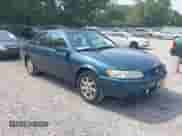 1997 Toyota Camry LE z VIN 4T1BF22K2VU922475, wystawiony jako IAAI lot #42883744 z przebiegiem 131 677 mil mil oraz . Historia ofert i sprzedaży dostępna na DreamBid. Obrazek 1.