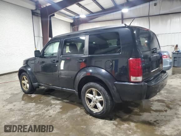 2008 Dodge Nitro SXT with VIN 1D8GU28KX8W118037, listed as a Copart auction lot 81723885 with 180,538 mi miles and Salvage title. Bid and sale history available at DreamBid. Image 2.