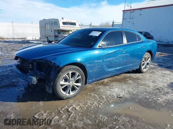 2023 Dodge Charger SXT with VIN 2C3CDXJG1PH520014, listed as a IAAI auction lot 41336951 with 59,064 mi miles and . Bid and sale history available at DreamBid. Image 2.
