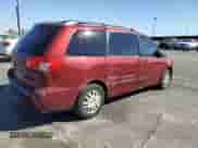 2009 Toyota Sienna LE с VIN 5TDZK23C69S258228, выставлен на аукционе Copart как лот 82336515 с пробегом 268 165 миль миль и Списание • Salvage title. История ставок и продаж доступна на DreamBid. Изображение 3.