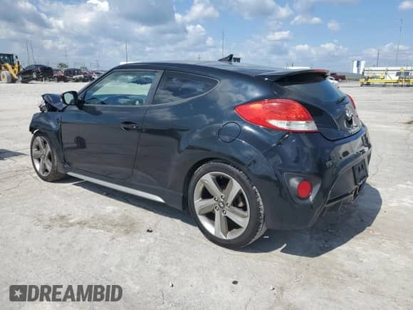 2013 Hyundai Veloster Turbo с VIN KMHTC6AE5DU144381, выставлен на аукционе Copart как лот 81855345 с пробегом 172 238 миль миль и Списание • Salvage title. История ставок и продаж доступна на DreamBid. Изображение 2.