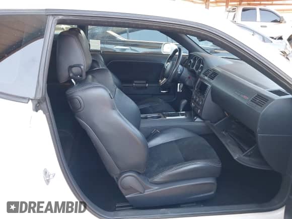 2013 Dodge Challenger SRT-8 with VIN 2C3CDYCJ1DH588064, listed as a IAAI auction lot 42283713 with 143,262 mi miles and . Bid and sale history available at DreamBid. Image 5.