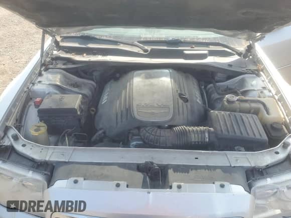 2008 Chrysler 300 C Hemi с VIN 2C3LA63H78H211061, выставлен на аукционе Copart как лот 71442965 с пробегом 212 054 миль миль и Списание • Salvage title. История ставок и продаж доступна на DreamBid. Изображение 11.