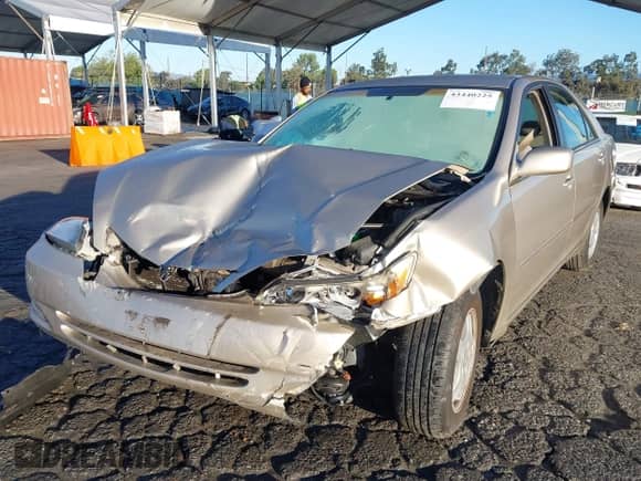 2003 Toyota Camry LE with VIN 4T1BF32K83U046675, listed as a IAAI auction lot 43440225 with 84,186 mi miles and . Bid and sale history available at DreamBid. Image 2.