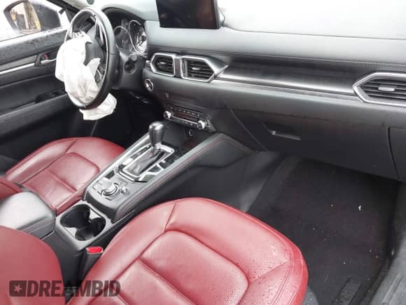 2023 Mazda CX-5 S Preferred z VIN JM3KFBCM8P0281595, wystawiony jako IAAI lot #42633863 z przebiegiem 26 513 mil mil oraz . Historia ofert i sprzedaży dostępna na DreamBid. Obrazek 5.