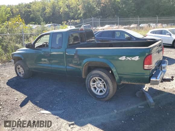 2003 Dodge Dakota z VIN 1D7HG42X63S185539, wystawiony jako Copart lot #73720794 z przebiegiem Nie podano mil oraz Szkoda całkowita • Salvage title. Historia ofert i sprzedaży dostępna na DreamBid. Obrazek 2.