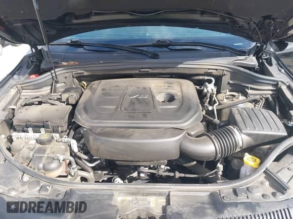 2022 Dodge Durango SXT with VIN 1C4RDHAG9NC159322, listed as a IAAI auction lot 42477809 with 82,361 mi miles and . Bid and sale history available at DreamBid. Image 10.