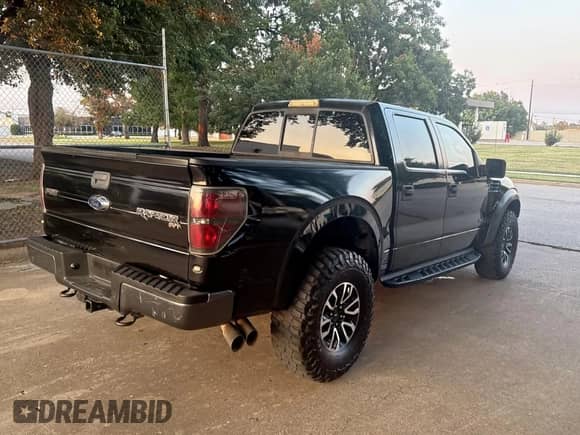 2013 Ford F-150 SVT Raptor with VIN 1FTFW1R66DFC88390, listed as a Copart auction lot 70960725 with 221,928 mi miles and Clean title. Bid and sale history available at DreamBid. Image 4.
