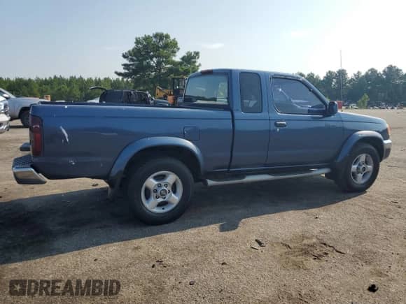 2000 Nissan Frontier XE z VIN 1N6ED26Y2YC430879, wystawiony jako Copart lot #63124615 z przebiegiem 339 386 mil mil oraz Szkoda całkowita • Salvage title. Historia ofert i sprzedaży dostępna na DreamBid. Obrazek 3.