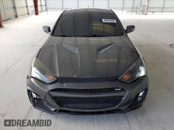 2013 Hyundai Genesis Coupe R-Spec z VIN KMHHU6KJ3DU093428, wystawiony jako Copart lot #66844335 z przebiegiem 132 829 mil mil oraz Szkoda całkowita • Salvage title. Historia ofert i sprzedaży dostępna na DreamBid. Obrazek 5.