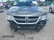 2013 Dodge Journey American Value z VIN 3C4PDCAB2DT560776, wystawiony jako IAAI lot #42988970 z przebiegiem 126 698 mil mil oraz . Historia ofert i sprzedaży dostępna na DreamBid. Obrazek 6.