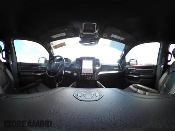 2023 Ram 1500 Laramie with VIN 1C6SRFJT4PN667913, listed as a IAAI auction lot 42223411 with 53,513 mi miles and . Bid and sale history available at DreamBid. Image 22.