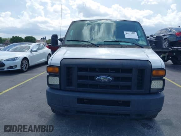 2012 Ford Econoline Cargo Commercial with VIN 1FTNS2EW8CDA13858, listed as a IAAI auction lot 42473899 with 336,332 mi miles and . Bid and sale history available at DreamBid. Image 12.