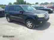 2010 Honda Pilot Touring z VIN 5FNYF3H91AB008620, wystawiony jako IAAI lot #42787416 z przebiegiem 199 649 mil mil oraz . Historia ofert i sprzedaży dostępna na DreamBid. Obrazek 1.