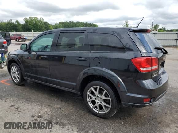 2013 Dodge Journey R/T Rallye z VIN 3C4PDDEG2DT591943, wystawiony jako Copart lot #65811805 z przebiegiem 132 731 mil mil oraz Szkoda całkowita • Salvage title. Historia ofert i sprzedaży dostępna na DreamBid. Obrazek 2.