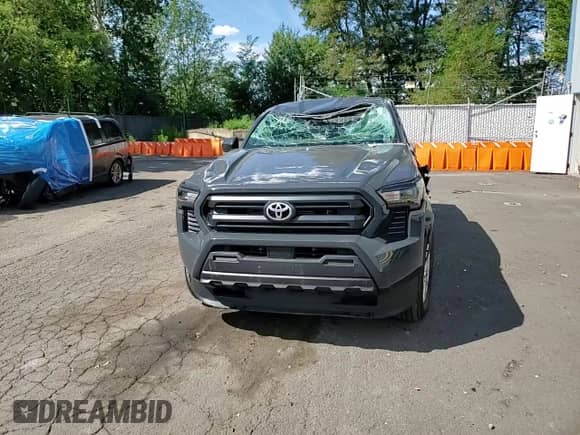 2024 Toyota Tacoma SR with VIN 3TYKD5HN0RT013601, listed as a Copart auction lot 69126575 with 4,033 mi miles and Salvage title. Bid and sale history available at DreamBid. Image 13.